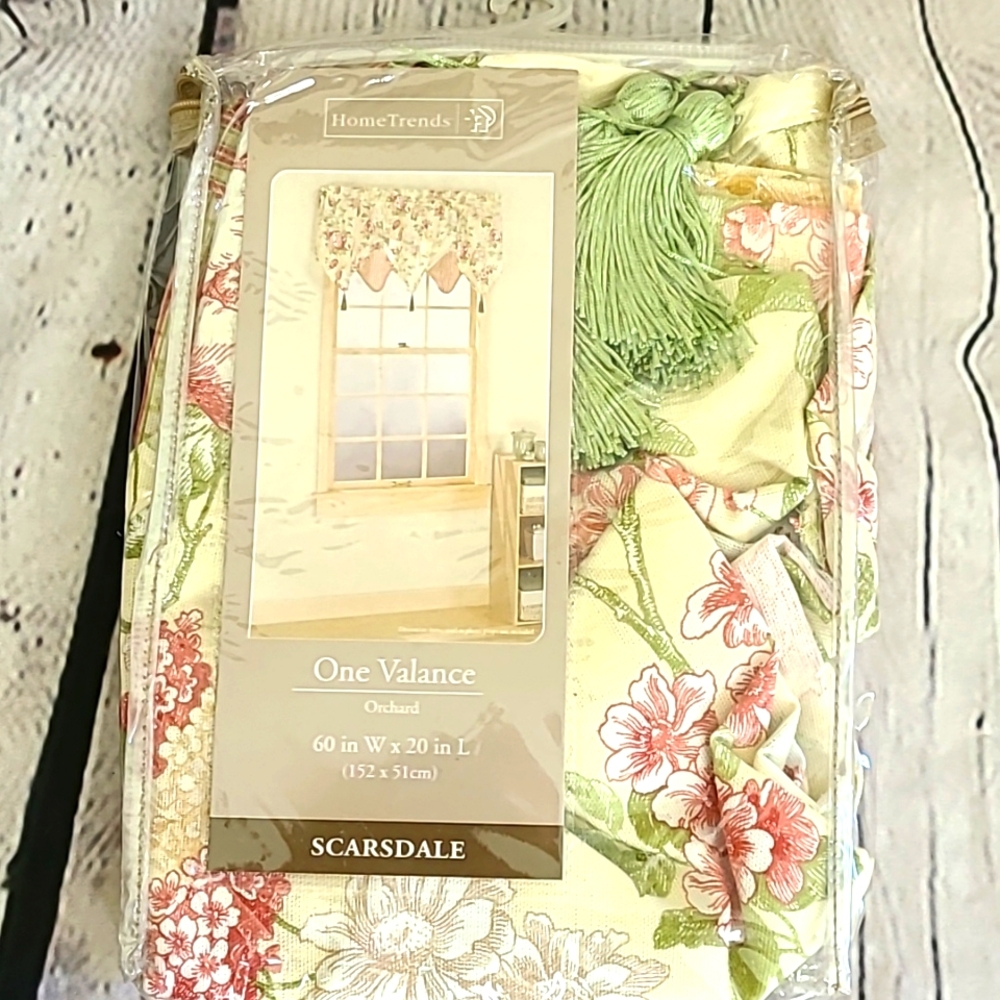Valance, new in pkg.  60" wide x 20" long.  Floral and striped fabric w/ tassels